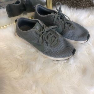 Olive green Nike running shoes